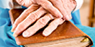 Hands Over Bible